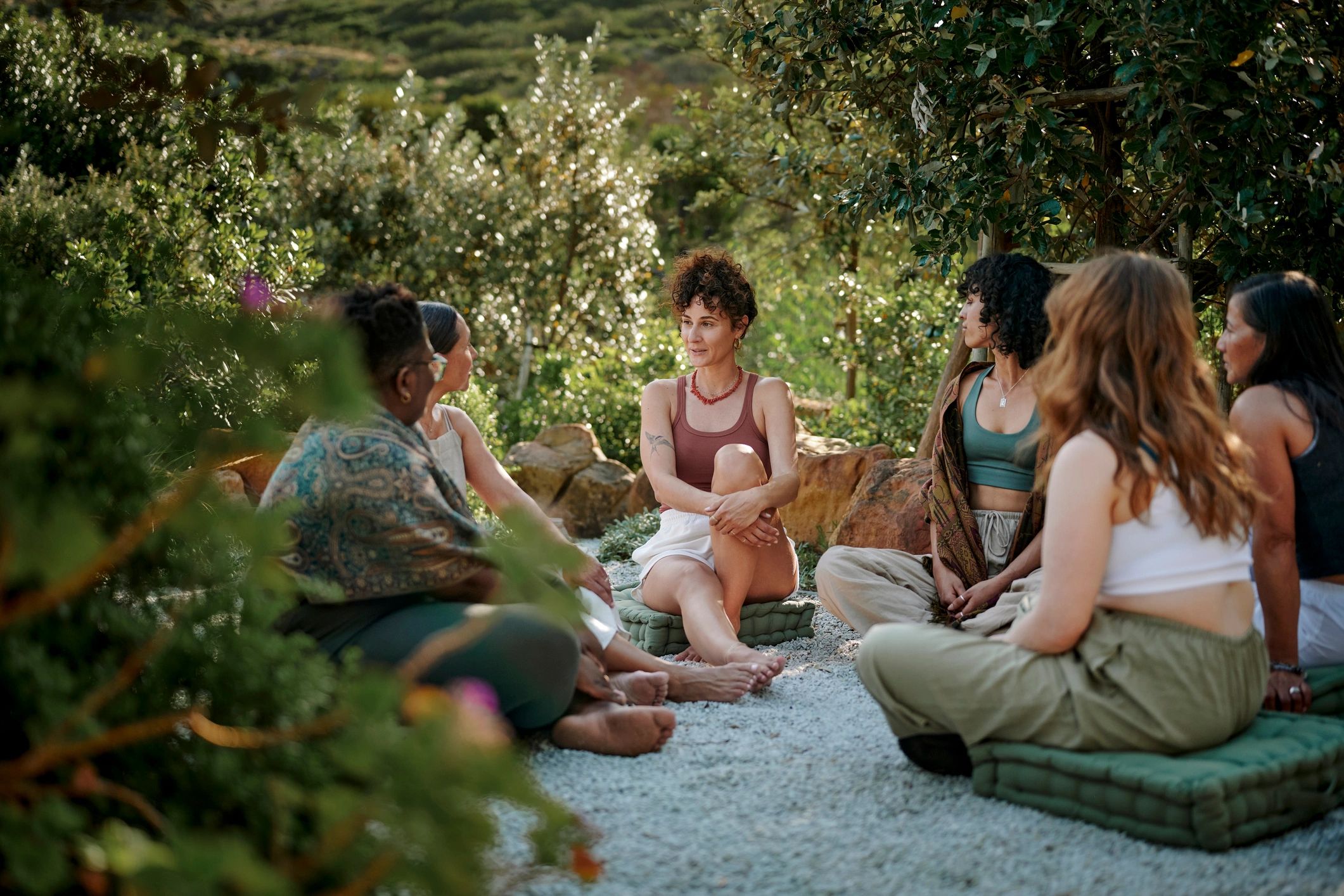 Community members connecting in a wellness circle